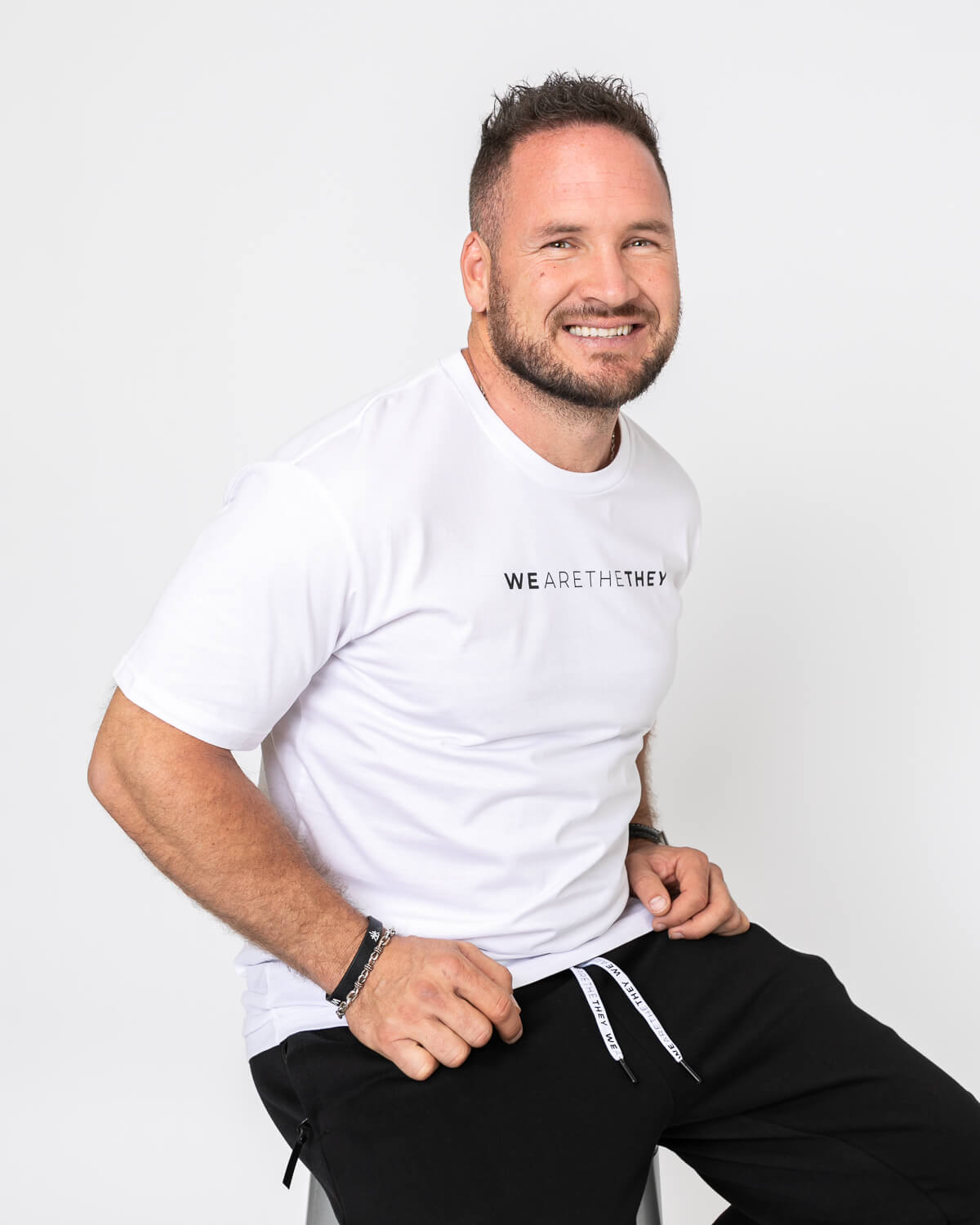 We Are The They Words Across Chest - White