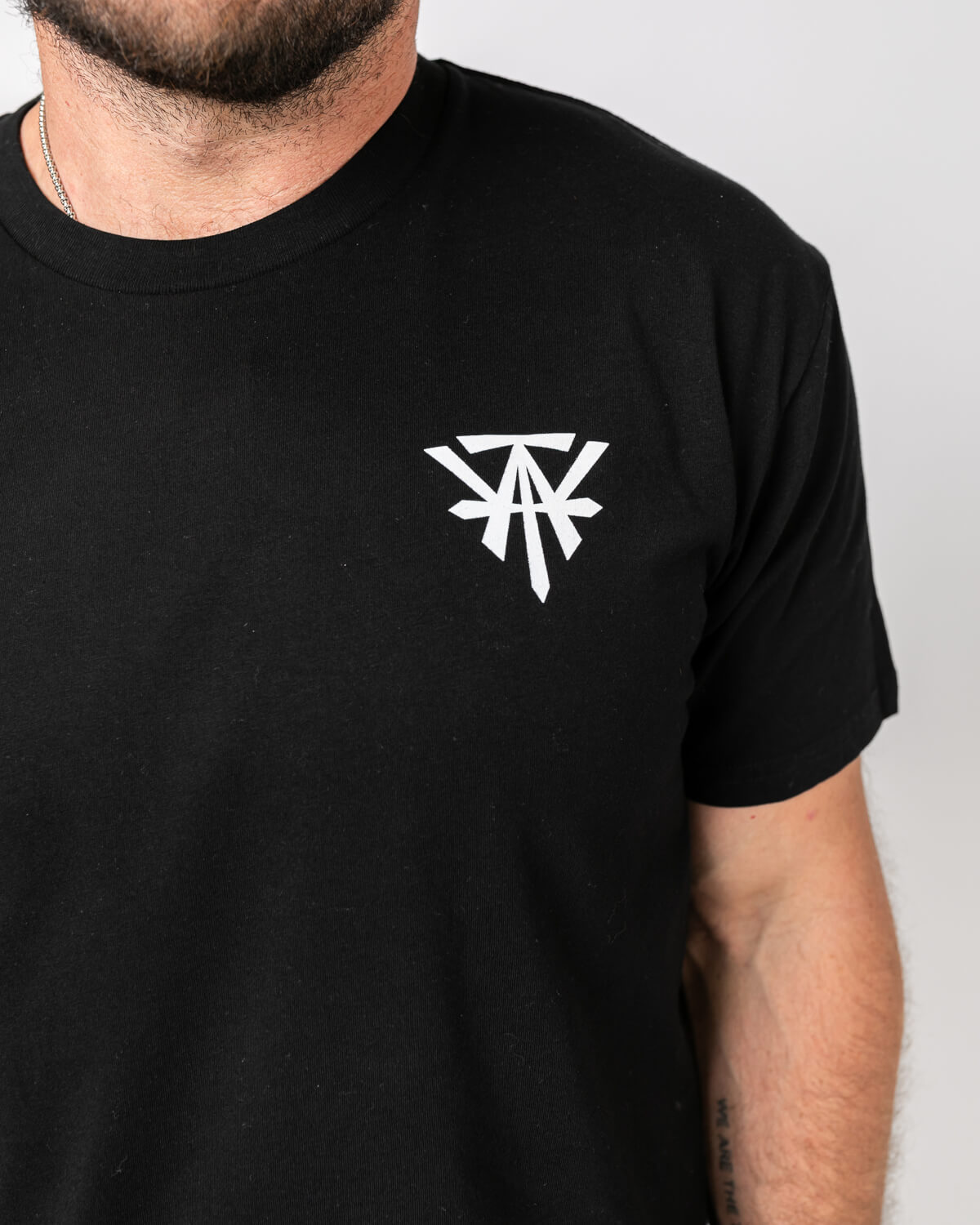 Black Tee With Logo On Chest
